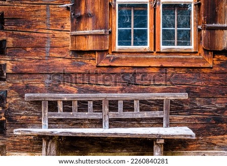 typical old wooden bench - parkbench - photo Royalty-Free Stock Photo #2260840281