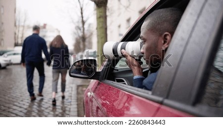 Private Detective Spying On Cheating Woman Wife Royalty-Free Stock Photo #2260843443