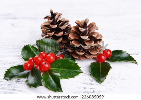 Composition of Christmas decorations on wooden background
