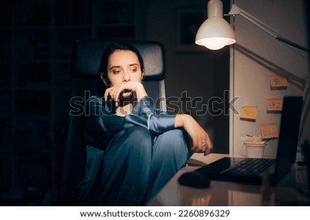 
Sad Lonely Woman Sitting at Home Working at Night. Unhappy person checking for symptoms online unable to sleep
 Royalty-Free Stock Photo #2260896329
