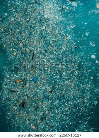Indian ocean and plastic trash, aerial view. Pollution by plastic rubbish Royalty-Free Stock Photo #2260915127