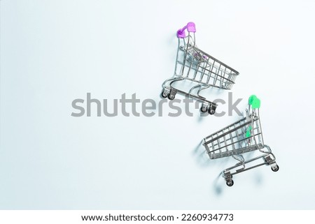 Empty grocery basket on a blue background close-up. The concept of business, sales and retail.