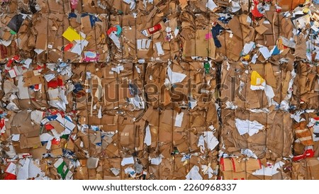 stacked waste paper and and cardboard collected for recycling Royalty-Free Stock Photo #2260968337