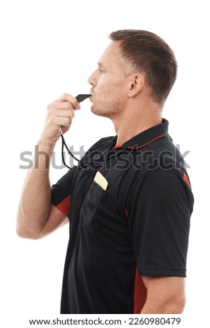 Referee man, whistle and face profile with soccer foul and warning in match or game isolated on white background. Sports, fitness and compliance, rules and male in studio with football penalty Royalty-Free Stock Photo #2260980479