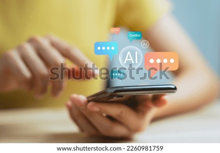 Hand using smartphone and chatting with chatbot application, shows message speech bubbles digital screen of social media notifications. Ai (Artificial Intelligence) technology concept.