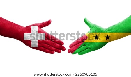 Handshake between Switzerland and Sao Tome and Principe flags painted on hands, isolated transparent image.