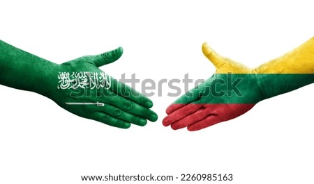 Handshake between Lithuania and Saudi Arabia flags painted on hands, isolated transparent image.