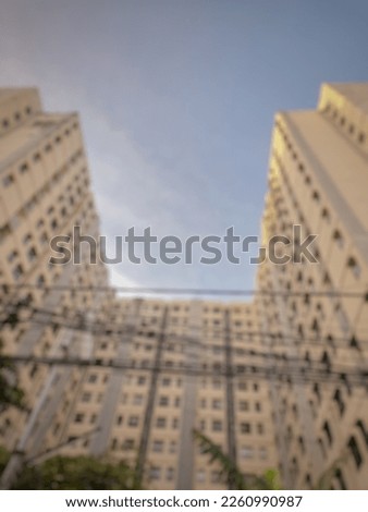 blurred picture of building (rumah susun) in the Indonesia. Defocused background