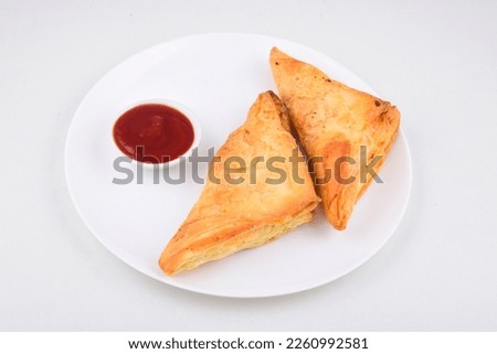Potato Patties served with ketchup in plate isolated on white background Royalty-Free Stock Photo #2260992581