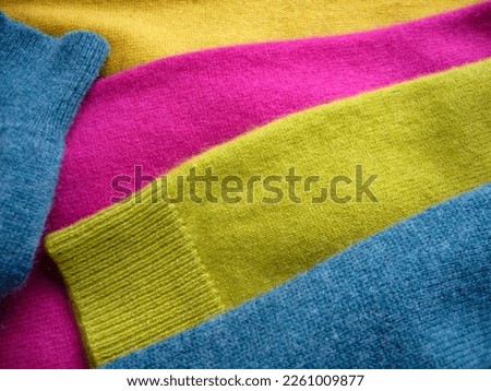 Natural cashmere fabric. Knitwear. Cashmere, wool. Texture of natural wool fabric. Royalty-Free Stock Photo #2261009877