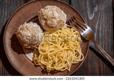 Meatballs with pasta, the concept of everyday food. Background picture.