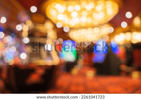 casino bokeh light abstract blur background,Blurred image of slots machines at the Casino games on a cruise ship