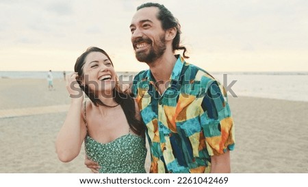 Happy couple in love standing on the coast, close-up Royalty-Free Stock Photo #2261042469