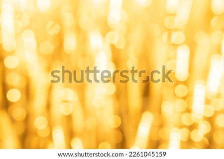 Abstract yellow light twinkled bright background with bokeh defocused lights Royalty-Free Stock Photo #2261045159