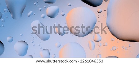 Water drops on glass, raindrops, texture, banner and background, blue and orange drops