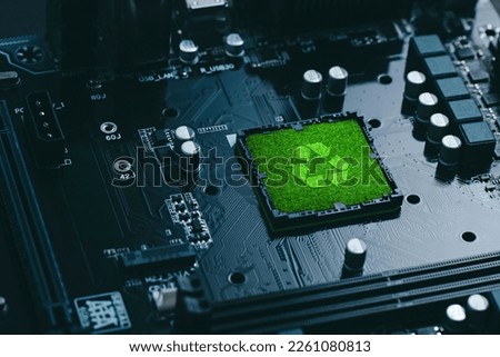 Concept of green technology. green recycle sign on circuit board technology innovations. Environment Green Technology Computer Chip.Green Computing andTechnology,  CSR, and IT ethics