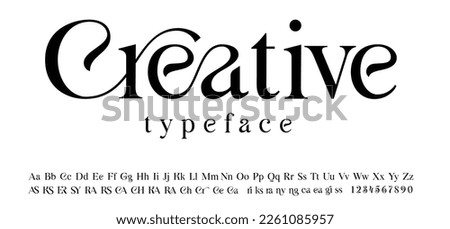 A modern trendy Font with a set of ligatures, this font can be used for logos Royalty-Free Stock Photo #2261085957