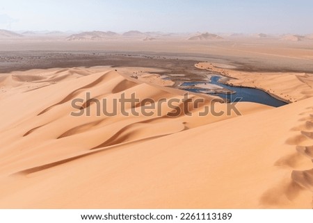 Lakes in the Empty Quarter desert in Saudi Arabia Royalty-Free Stock Photo #2261113189