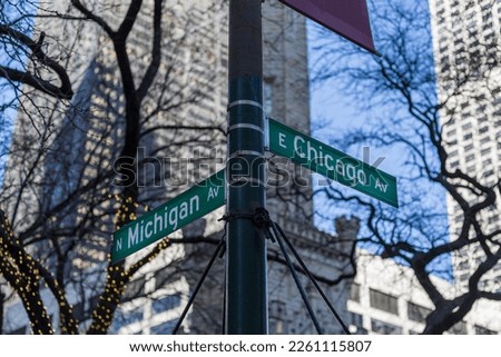 Corner of Michigan ave and Chicago Ave at the Magnificent Mile in uptown Chicago on clear day