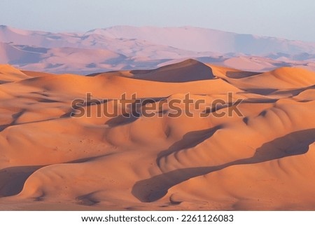 Sand dunes in Saudi Arabia, Empty Quarter Royalty-Free Stock Photo #2261126083