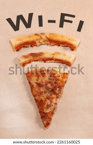 pizza in the shape of a wifi sign, the inscription wi-fi, concept of free internet in a pizzeria. Vertical Orientation
