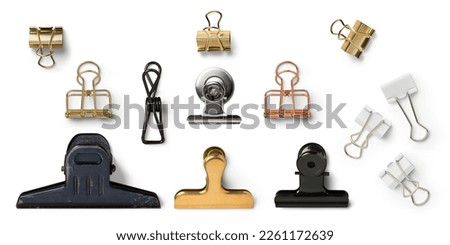 set of various paper clips isolated over a white background, office desk stationery, golden, silver, black, white, and rose gold design elements for attachments to your layouts or moodboards Royalty-Free Stock Photo #2261172639