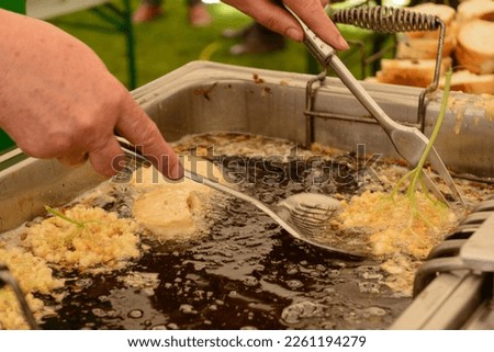 elder donuts, a special pancakes freshly prepared Royalty-Free Stock Photo #2261194279