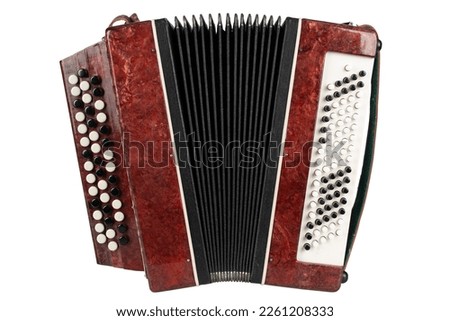 Small retro bayan (accordion). Folk musical instrument. Isolated on white background.