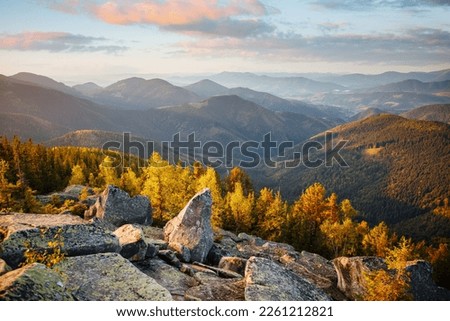 A peaceful view of distant mountain ranges in morning light. Location place Carpathian mountains, Ukraine, Europe. Vibrant photo wallpaper. Image of wild protected area. Discover the beauty of earth. Royalty-Free Stock Photo #2261212821