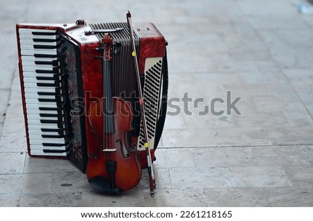 Musical instruments: accordion and violin