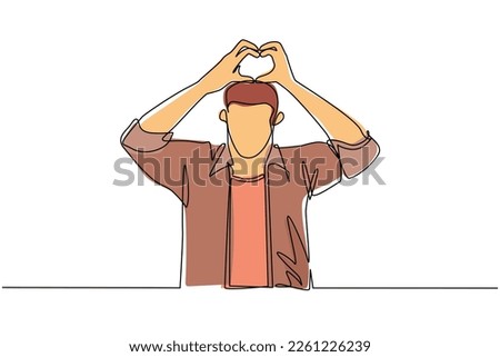 Single continuous line drawing young man making or gesturing heart symbol with fingers. Modern male lifestyle, healthcare, love shape concept. Dynamic one line draw graphic design vector illustration