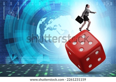 Businesswoman in uncertainty concept with dice Royalty-Free Stock Photo #2261231159