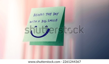 Beginnings, Start and Mental Health Concept. Note on the Mirror with a Big Smiling Face Cartoon. Remind and Practice to Start the Day with a Positive Mind Royalty-Free Stock Photo #2261244367
