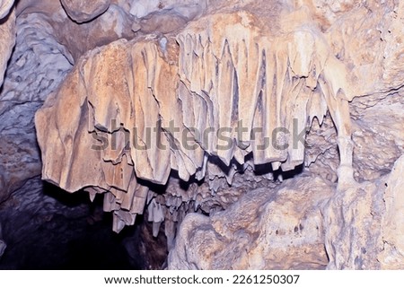 View of stalagmites and stalactites in the cave