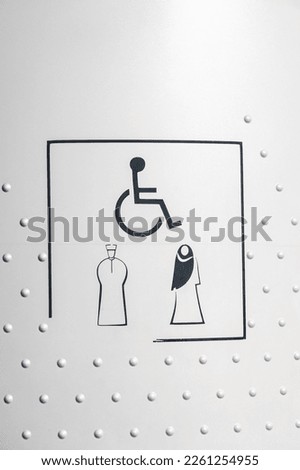 A bathroom sign in the Middle East