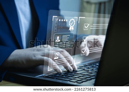 Personnel Assessment Certificate, organizational quality person metrics, recommendations, online employee rating. HR uses laptop computers to rate and review employees. Royalty-Free Stock Photo #2261275813