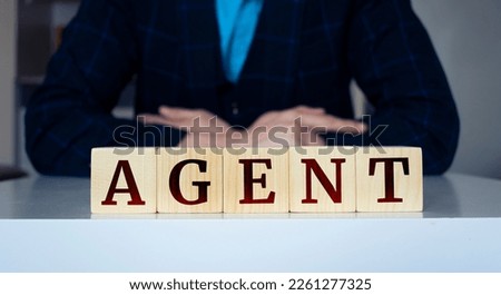 The word "Agent" written on wood cube. Business concept