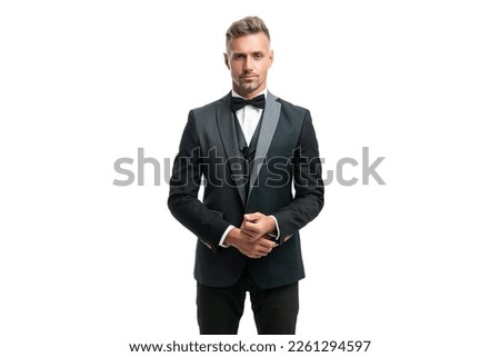 handsome man in suit and bow tie. businessman isolated on white. boss in formal wear Royalty-Free Stock Photo #2261294597