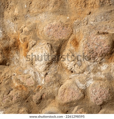 Large stones in the wall as an abstract background. Texture