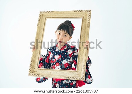Asian girl in a yukata. Summer festival.