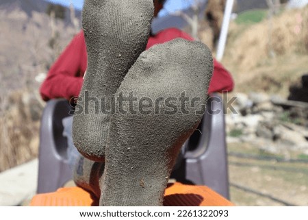Picture of man wearing socks in winter