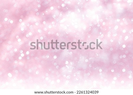 Pink abstract sparkles or glitter lights Defocused circles bokeh background