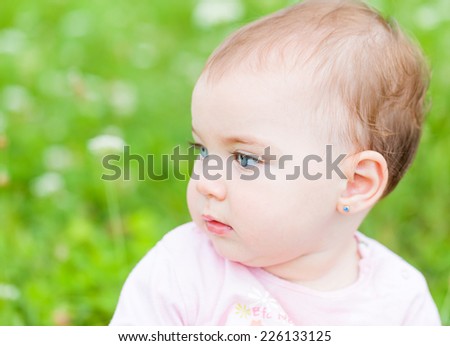 Close up photo of an adorable baby girl