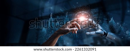 AI, Machine learning, Hands of robot and human touching on big data network connection, Data exchange, deep learning, Science and artificial intelligence technology, innovation of futuristic. Royalty-Free Stock Photo #2261332091