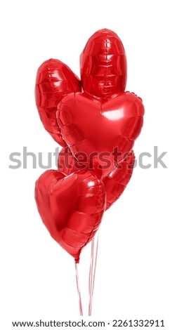 Many red heart shaped balloons isolated on white. Valentine's day celebration