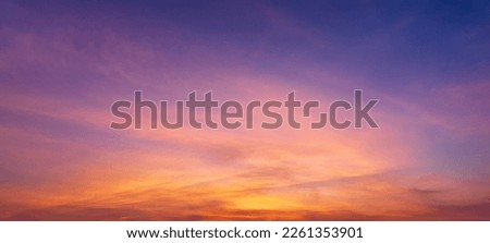 Photos of twilight sky before sunrise or after sunset, clouds fill the sky, panoramic image. orange tones, natural phenomenon background.