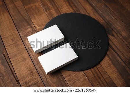 Blank business cards and slate cutting board. Mockup for ID. Template for graphic designers portfolios.