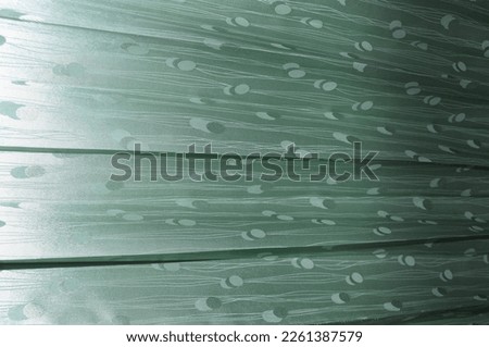 green background with round pattern of curtain fabric with light gradation effect