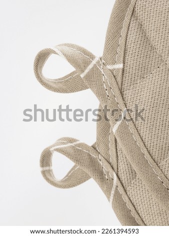 a set of kitchen tacks made of cotton fabric with a loop, isolated
