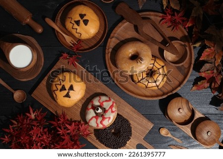 Halloween character donuts with wooden sets that add to the warmth of the atmosphere